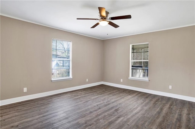 empty room with dark wood-type flooring, ceiling fan, and ornamental molding