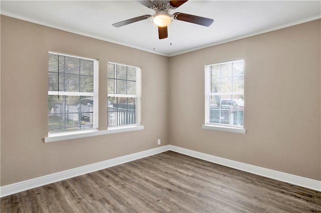 unfurnished room with ceiling fan and hardwood / wood-style floors