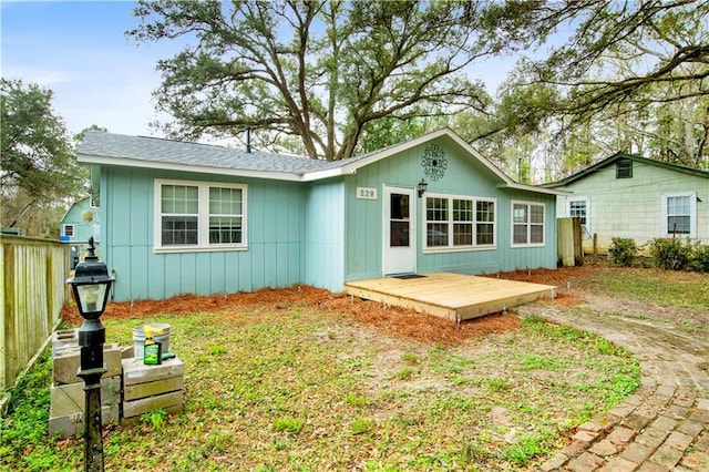 rear view of property with a deck