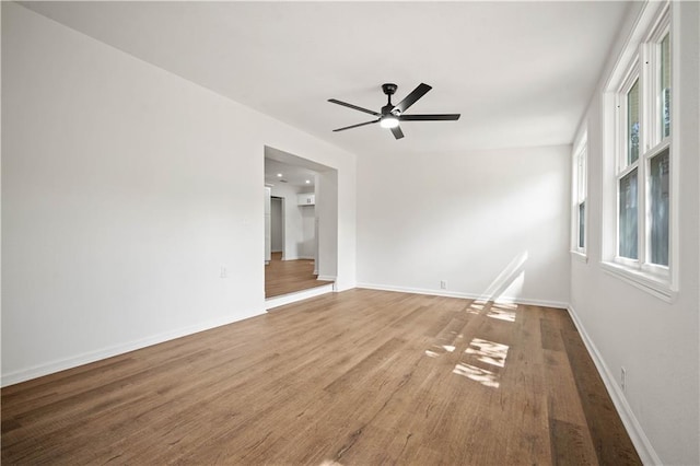 3001 Demetropolis Rd, Mobile, AL 36693 - empty room with baseboards, a ceiling fan, and wood finished floors