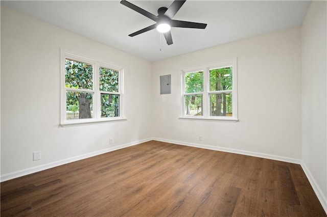 3001 Demetropolis Rd, Mobile, AL 36693 - empty room featuring baseboards, ceiling fan, wood finished floors, and electric panel
