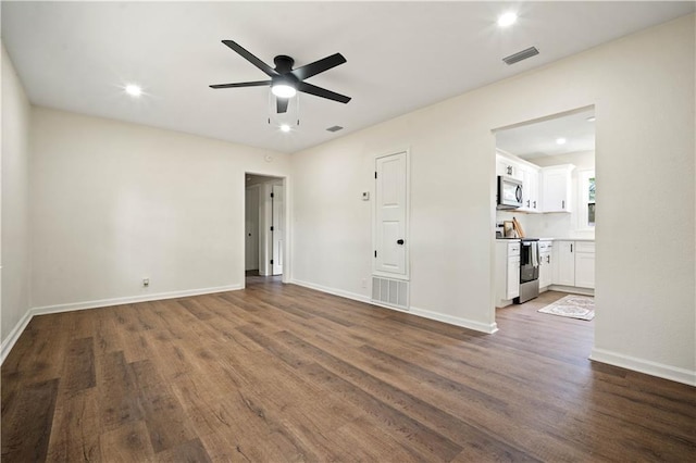 3001 Demetropolis Rd, Mobile, AL 36693 - empty room with visible vents, dark wood-style flooring, ceiling fan, and baseboards