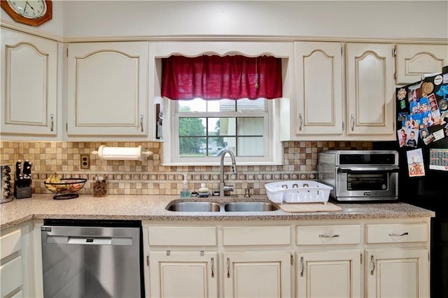 8717 Louis Poiroux Rd N, Theodore, AL 36582 - kitchen with dishwasher, a sink, cream cabinetry, and tasteful backsplash