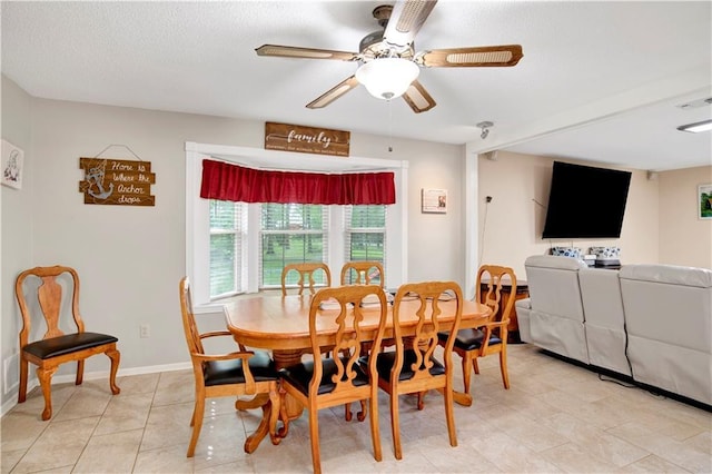 8717 Louis Poiroux Rd N, Theodore, AL 36582 - dining space featuring a ceiling fan and light tile patterned floors