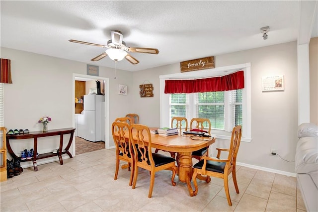 8717 Louis Poiroux Rd N, Theodore, AL 36582 - dining area featuring ceiling fan and baseboards