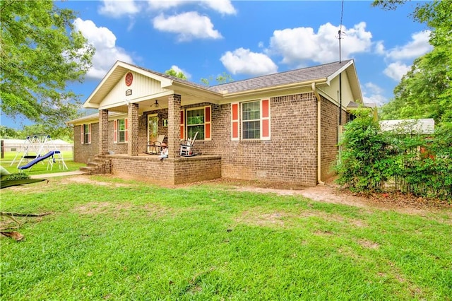 8717 Louis Poiroux Rd N, Theodore, AL 36582 - view of front of home with brick siding and roof with shingles