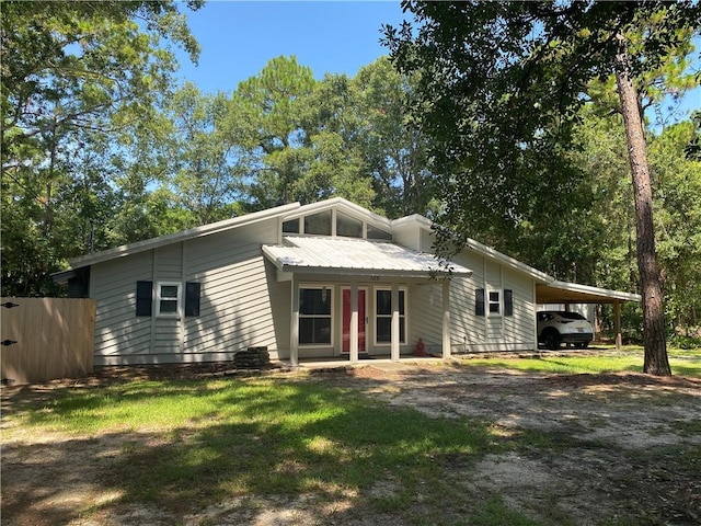 view of front of house with a carport