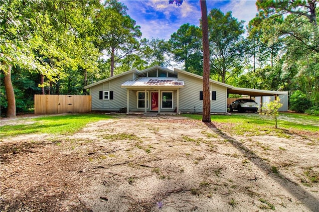 view of front facade featuring a carport