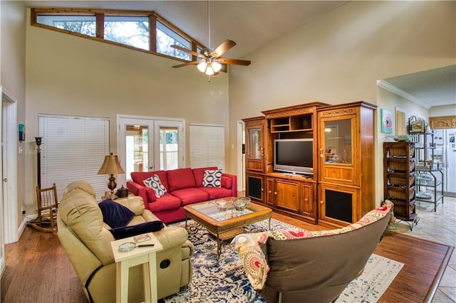 living room featuring french doors, wood-type flooring, ceiling fan, and high vaulted ceiling