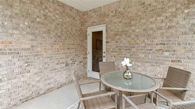 10560 Relic Rd S, Mobile, AL 36608 - dining room with brick wall