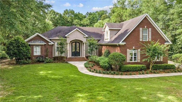 10188 Rosewood Ln, Daphne, AL 36526 - view of front facade featuring brick siding and a front yard