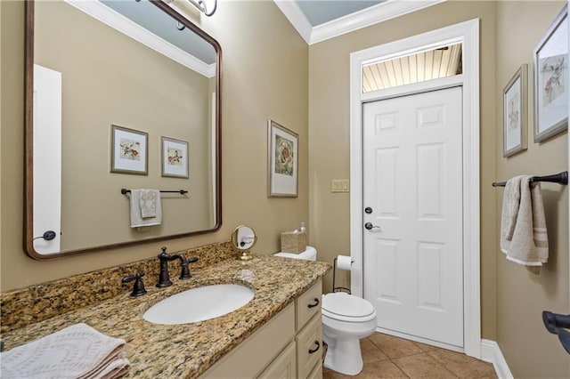 10188 Rosewood Ln, Daphne, AL 36526 - bathroom featuring crown molding, tile patterned flooring, toilet, vanity, and baseboards