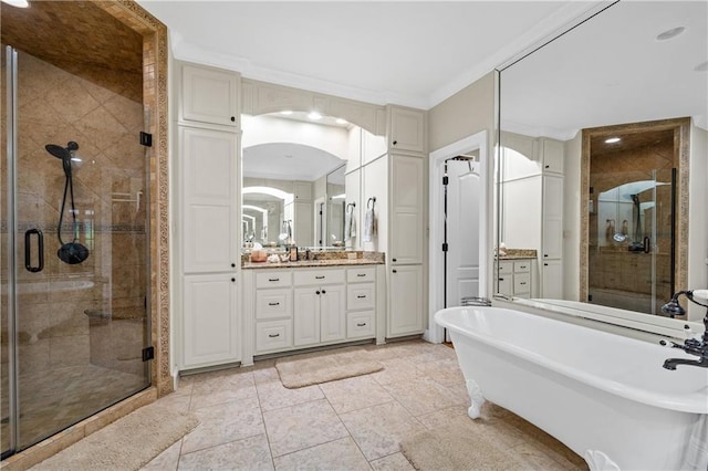10188 Rosewood Ln, Daphne, AL 36526 - full bath with a shower stall, vanity, a freestanding bath, and ornamental molding