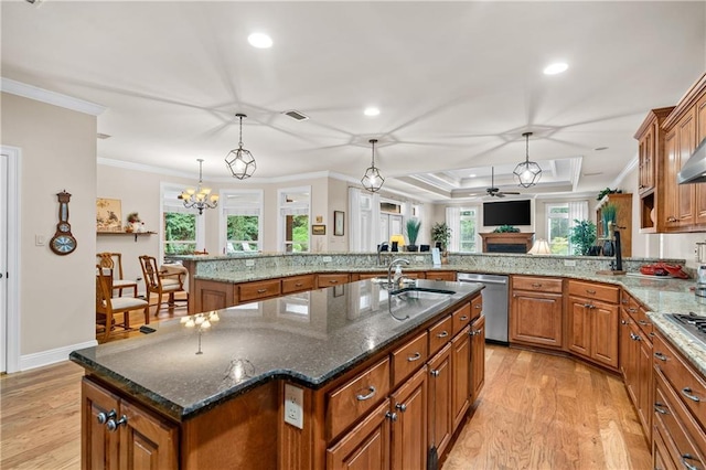 10188 Rosewood Ln, Daphne, AL 36526 - kitchen with stainless steel dishwasher, a sink, brown cabinetry, a kitchen island with sink, and light wood-style flooring