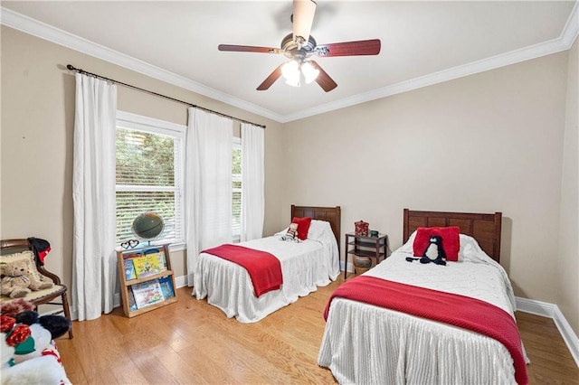 10188 Rosewood Ln, Daphne, AL 36526 - bedroom featuring wood finished floors, crown molding, baseboards, and ceiling fan