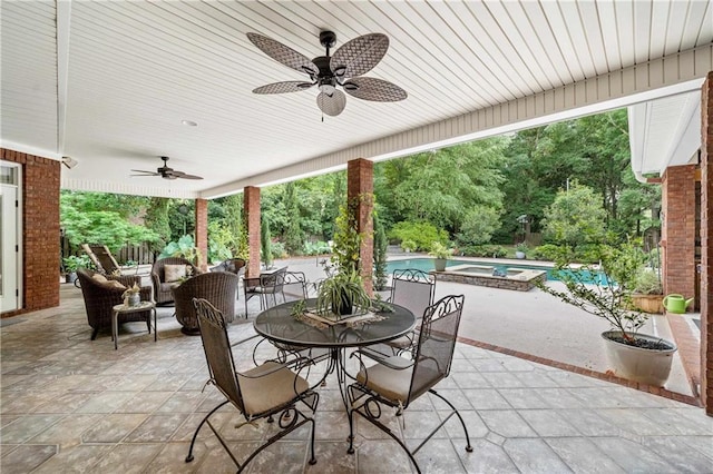 10188 Rosewood Ln, Daphne, AL 36526 - view of patio with ceiling fan, outdoor dining space, a pool with connected hot tub, and an outdoor hangout area