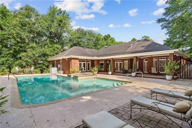 10188 Rosewood Ln, Daphne, AL 36526 - outdoor pool featuring french doors and a patio area