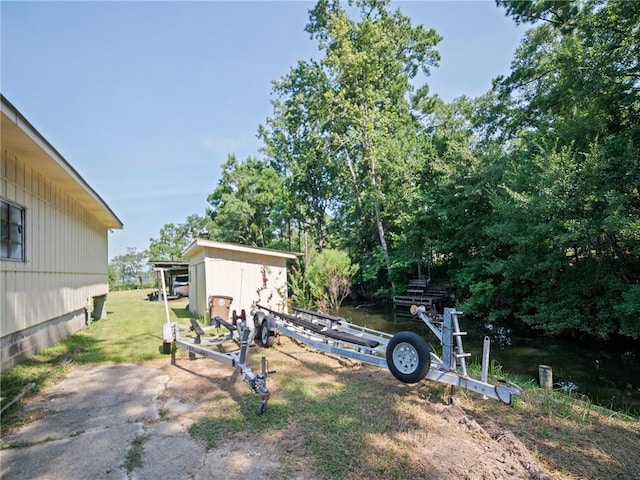 view of yard featuring a boat dock