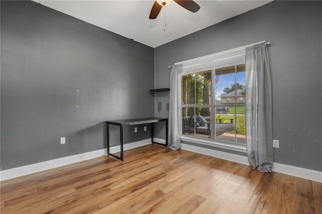 unfurnished room featuring ceiling fan, ornamental molding, and light hardwood / wood-style floors