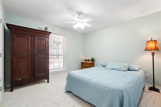 bedroom featuring ceiling fan