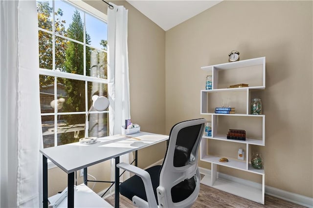 office with hardwood / wood-style flooring