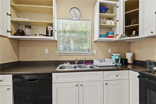 kitchen featuring black appliances, white cabinetry, and sink