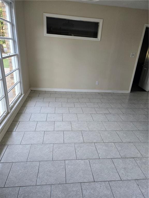 view of tiled spare room