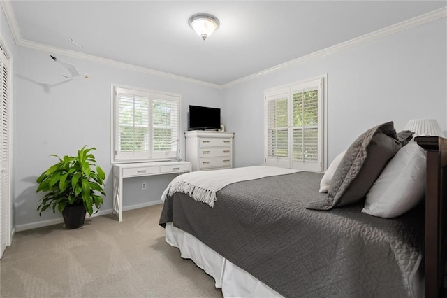 bedroom with crown molding and light carpet