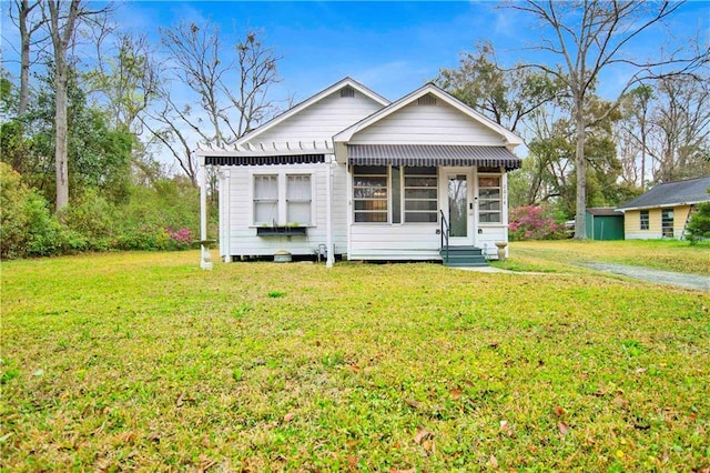2014 Bakers Ln, Mobile, AL 36605 - bungalow-style home with a front lawn and entry steps