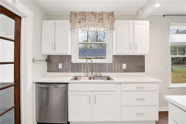 2014 Bakers Ln, Mobile, AL 36605 - kitchen featuring white cabinets, dishwasher, light countertops, and a sink