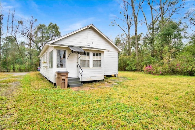 2014 Bakers Ln, Mobile, AL 36605 - back of property with a yard