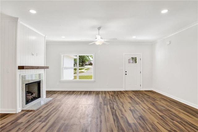 8760 Floyd Crabtree Way, Semmes, AL 36575 - unfurnished living room with baseboards, ornamental molding, a fireplace, and wood finished floors