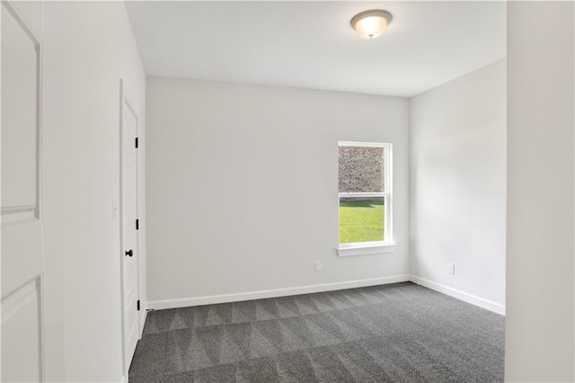 8760 Floyd Crabtree Way, Semmes, AL 36575 - empty room with dark colored carpet and baseboards