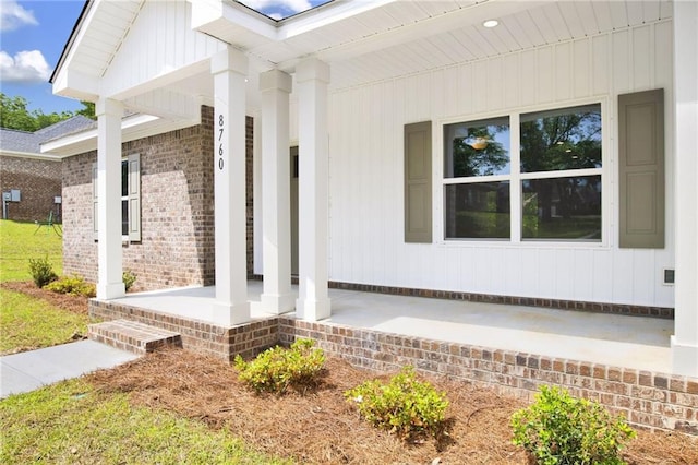 8760 Floyd Crabtree Way, Semmes, AL 36575 - entrance to property with covered porch and brick siding