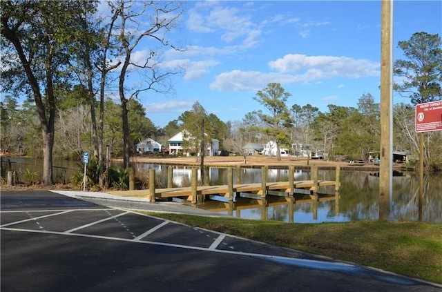 dock area featuring a water view