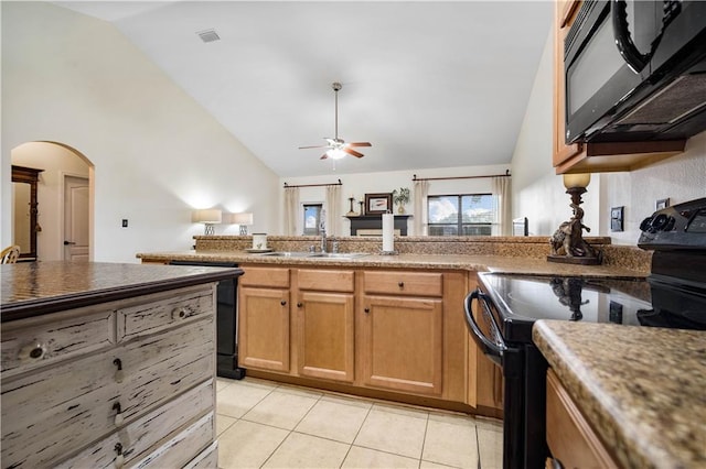 kitchen with high vaulted ceiling, black appliances, sink, ceiling fan, and light tile patterned flooring