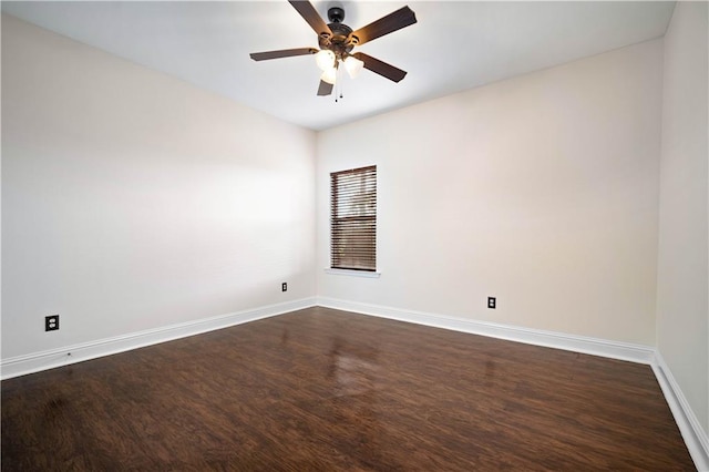 unfurnished room featuring ceiling fan and dark hardwood / wood-style floors