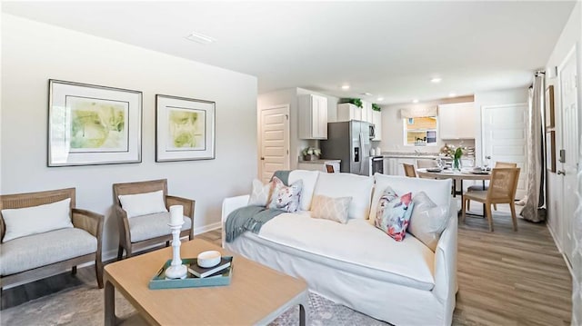 living room with hardwood / wood-style flooring