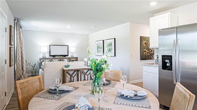 dining room featuring hardwood / wood-style flooring