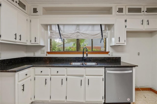 562 Vaughn Dr N, Satsuma, AL 36572 - kitchen with stainless steel dishwasher, a sink, white cabinets, and dark stone countertops