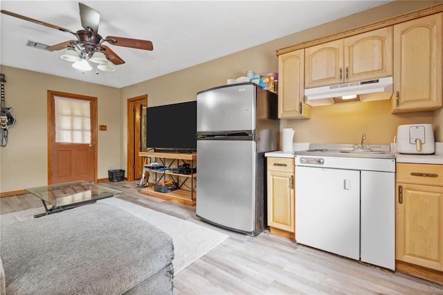 562 Vaughn Dr N, Satsuma, AL 36572 - kitchen featuring freestanding refrigerator, under cabinet range hood, light brown cabinetry, and a ceiling fan