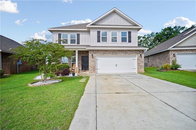 24341 Alydar Loop, Daphne, AL 36526 - view of front facade featuring brick siding, concrete driveway, a garage, and a front lawn