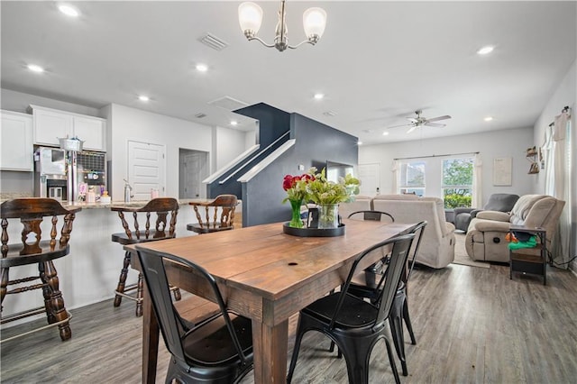 24341 Alydar Loop, Daphne, AL 36526 - dining room with wood finished floors, a ceiling fan, recessed lighting, and a chandelier