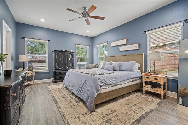24341 Alydar Loop, Daphne, AL 36526 - bedroom with baseboards, wood finished floors, a ceiling fan, and recessed lighting