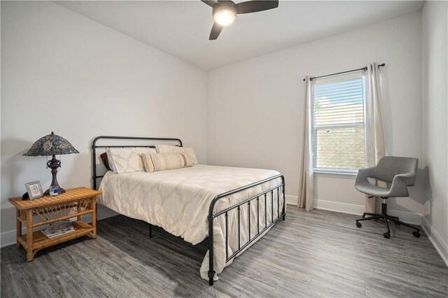 24341 Alydar Loop, Daphne, AL 36526 - bedroom featuring wood finished floors, baseboards, and a ceiling fan