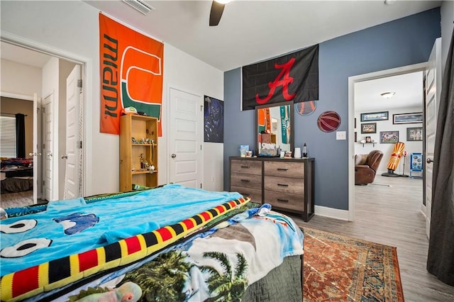 24341 Alydar Loop, Daphne, AL 36526 - bedroom featuring wood finished floors, baseboards, and a ceiling fan