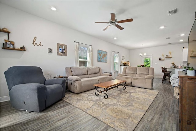 24341 Alydar Loop, Daphne, AL 36526 - living area with a chandelier, ceiling fan, wood finished floors, baseboards, and recessed lighting