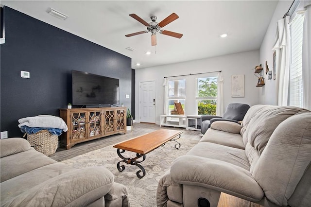 24341 Alydar Loop, Daphne, AL 36526 - living area featuring a ceiling fan, wood finished floors, recessed lighting, baseboards, and an accent wall