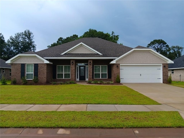 9246 Ofallon Dr, Mobile, AL 36695 - view of front of property with an attached garage, a front lawn, concrete driveway, and brick siding
