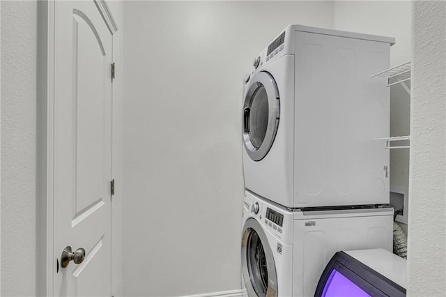 1385 Beach Blvd W, Gulf Shores, AL 36542 - laundry area featuring hookup for a washing machine and stacked washer / drying machine